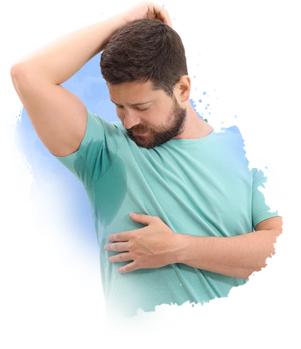 Man checking excessive underarm sweating and body odor caused by hyperhidrosis